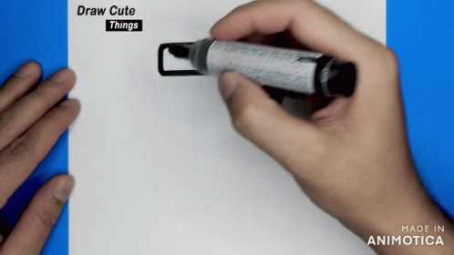 a person putting an ink marker in a piece of paper