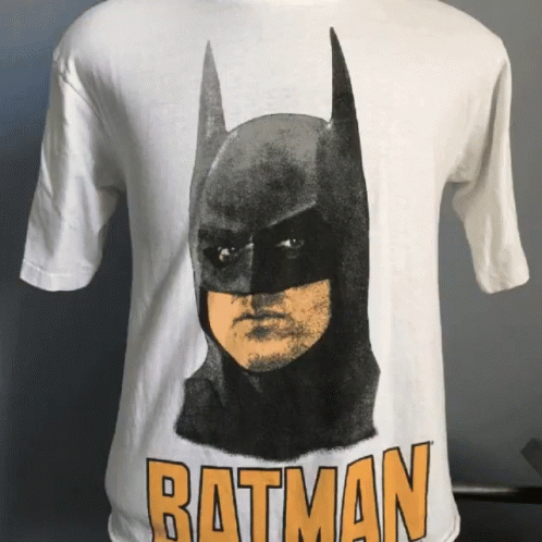 the batman shirt has the face of batman with blue makeup