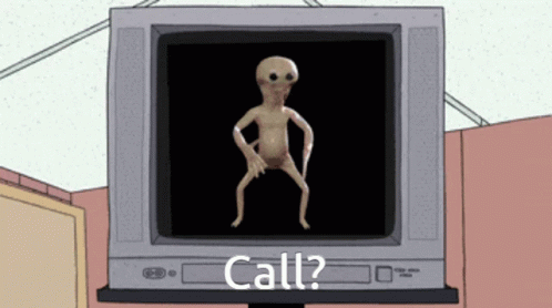 a picture of an alien on a television in a room