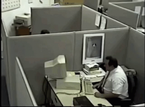 an old po shows a man working on the computer