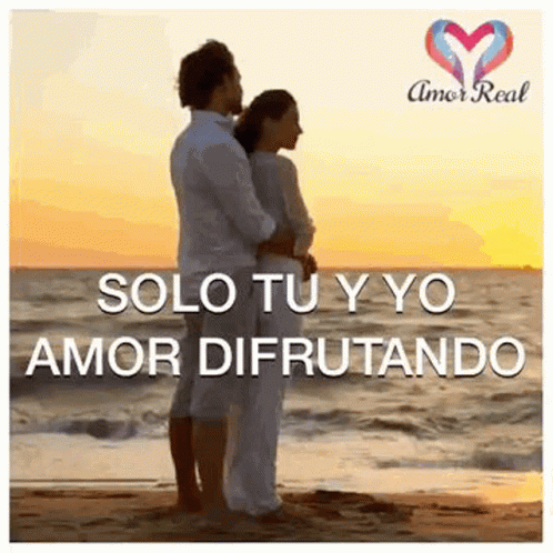 two people are standing near the ocean with the words solo tuyo armor difrutando