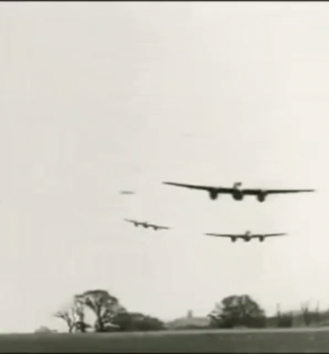 black and white po of three aircraft flying in the air