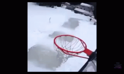 there is a blue basketball hoop in the snow