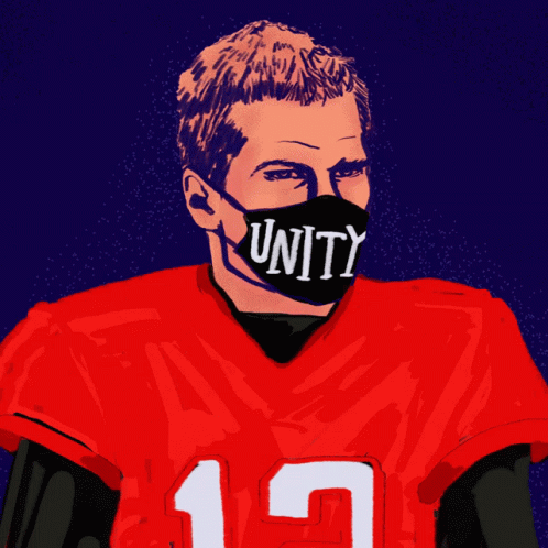 a guy wearing a face mask that says'unity '