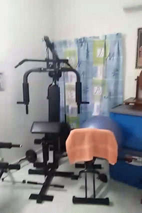 a room with exercise equipment in it