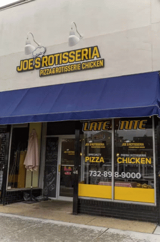 an advertit is displayed for joes rotisseia