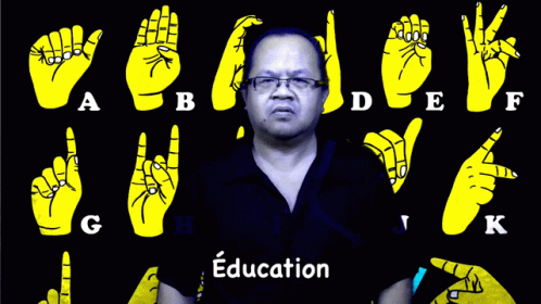 man in black shirt showing all fingers on a background