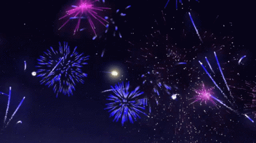 a bunch of firework are lit up in the night sky