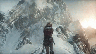 a po of a person standing on top of a snow covered mountain