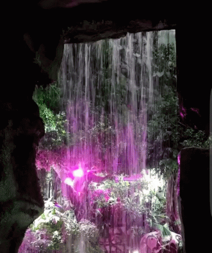 the image is blurred and shows an image of a waterfall
