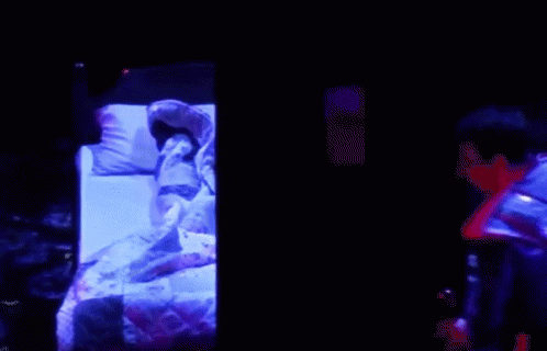 there is an image of a man sleeping in bed