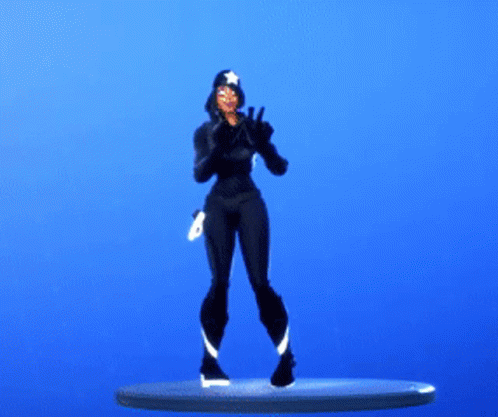 a woman in black cat costume standing on top of a surfboard