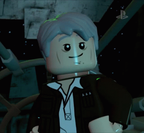 a lego character wearing a yellow tie and black jacket
