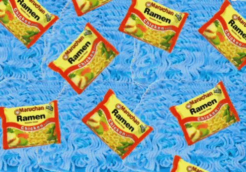 a pile of ramen sitting on top of a yellow table