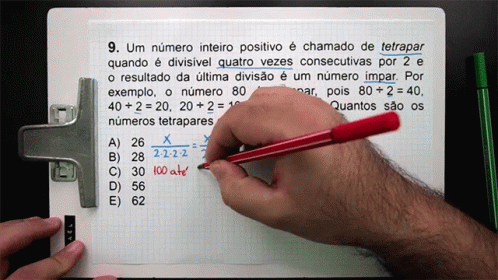 an image of a person writing on a page