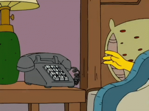 a computer screen showing a cartoon character on the telephone