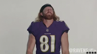 a man in a football jersey and a beard with no eyes