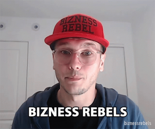 a man is wearing a blue hat with the word bizness rebles on it