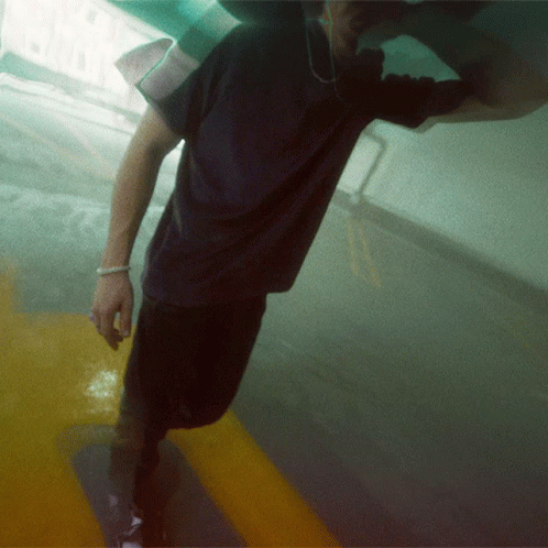 a man on a skateboard in an indoor skate park