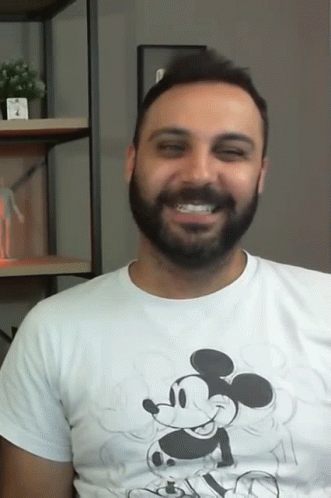 man in white shirt and mickey mouse on his tee