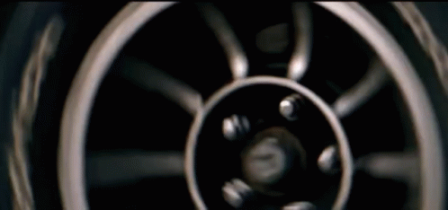 a close - up view of a chrome car wheel