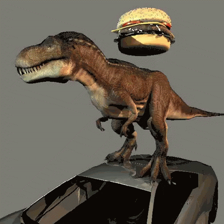 a toy t - shirt and a burger on top of a car