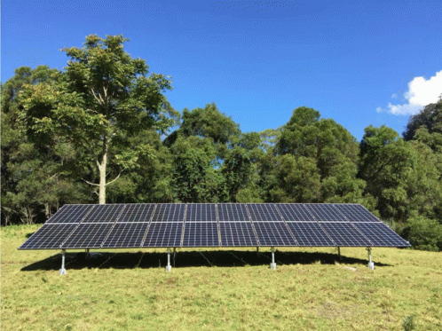 a solar array stands out in an open field