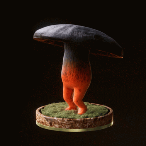 blue figure with large mushroom and body in dark area