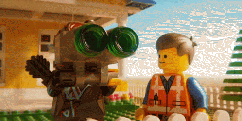 a scene from lego the movie star wars, with a little boy pointing at soing