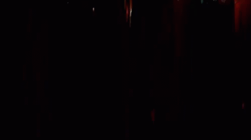 a po taken through a window in the dark