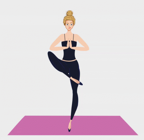 a woman in black yoga outfit on a purple mat