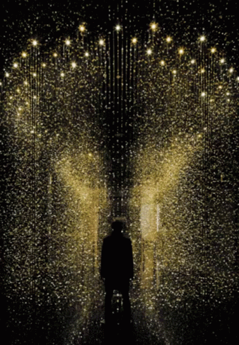a dark man stands in front of an open doorway in the midst of hundreds of stars