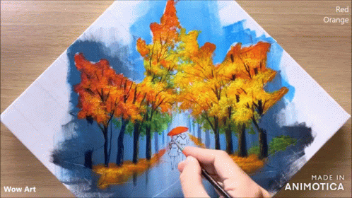 a person is drawing trees on a paper