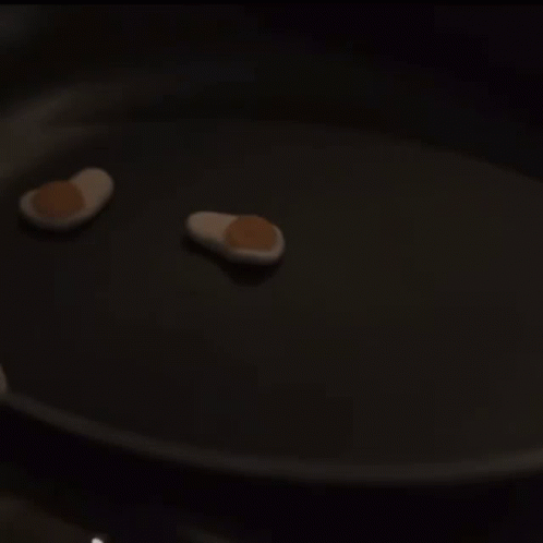 several pills placed in the pan on the stove