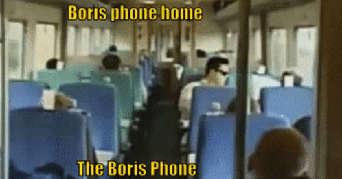 a man on a bus is looking at the phone