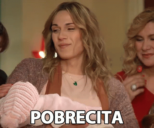 a woman holding a baby in her arms with the words pobrecta on it