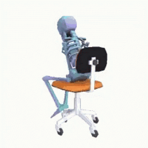 a skeleton sitting on a chair, it's a person with a cast