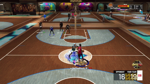 many people playing a sports video game on a large court
