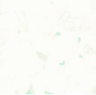 a light blue and white abstract background with small bits of green