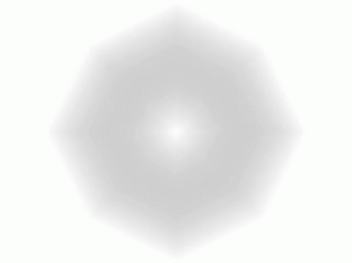 a circular object in the air with a white background