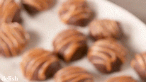 close up of small balls with candy coatings