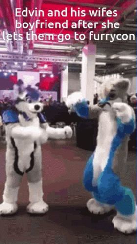 two people in animal costumes standing next to each other