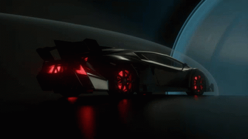 a concept car in the dark with blue lights