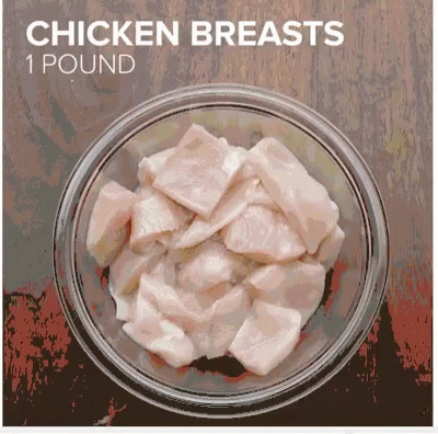 chicken  pieces displayed in a bowl of blue liquid