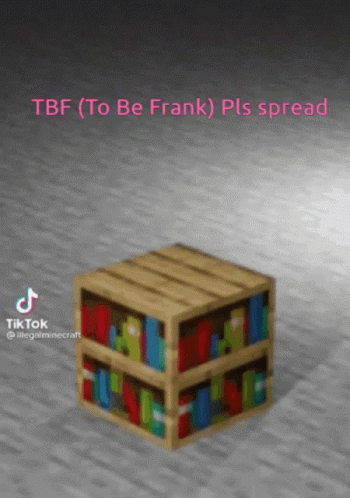 a toy cube on the floor with text that reads tbf to be frank plas spread