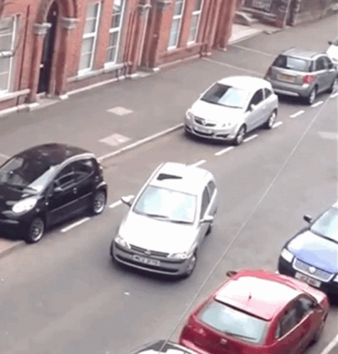 this is an image of cars on a city street