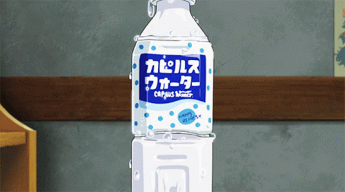a bottle of japanese liquid on a blue pedestal