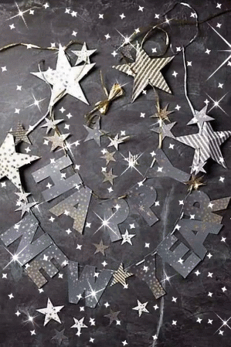 a table with decorative cut outs in the shape of stars