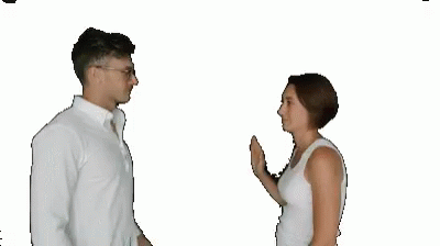 a man and woman are standing talking together