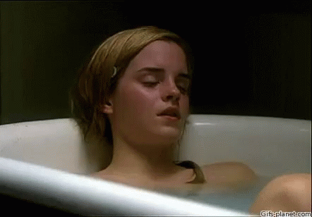 a close - up view of a woman in a bathtub
